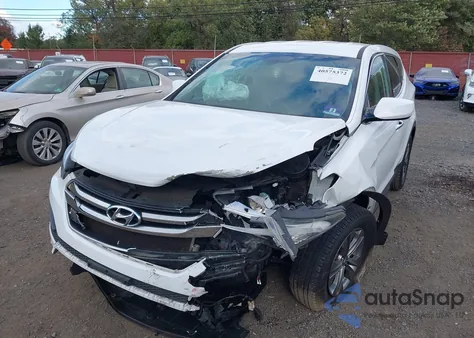 2015 Hyundai Santa Fe Sport 2.4L z USA, uszkodzony, nr VIN 5XYZTDLB0FG299995